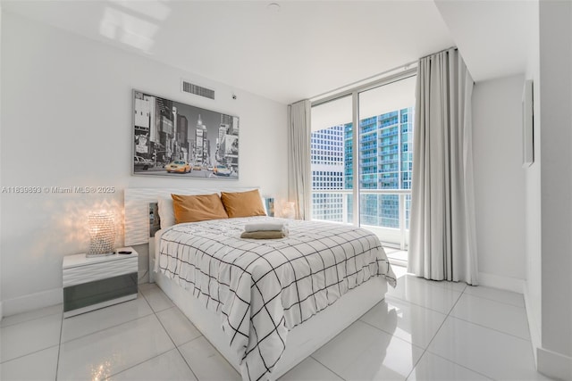 485 Brickell Ave Unit 2908, Miami, FL 33131 - bedroom with floor to ceiling windows and tile patterned floors