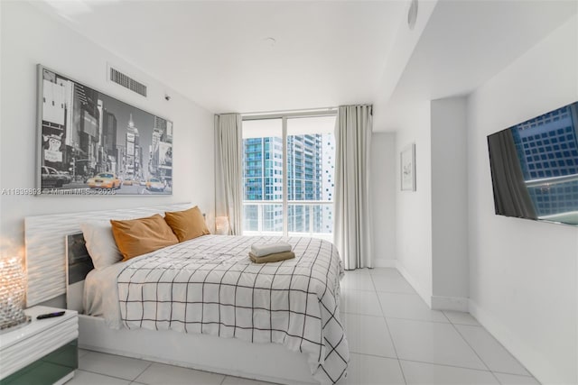 485 Brickell Ave Unit 2908, Miami, FL 33131 - tiled bedroom with baseboards
