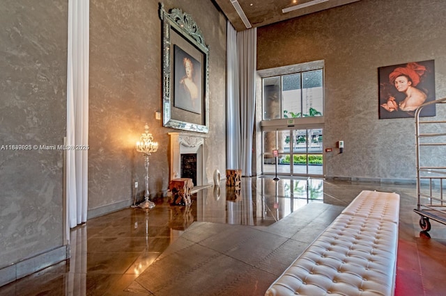 485 Brickell Ave Unit 2908, Miami, FL 33131 - building lobby with a towering ceiling and a textured wall