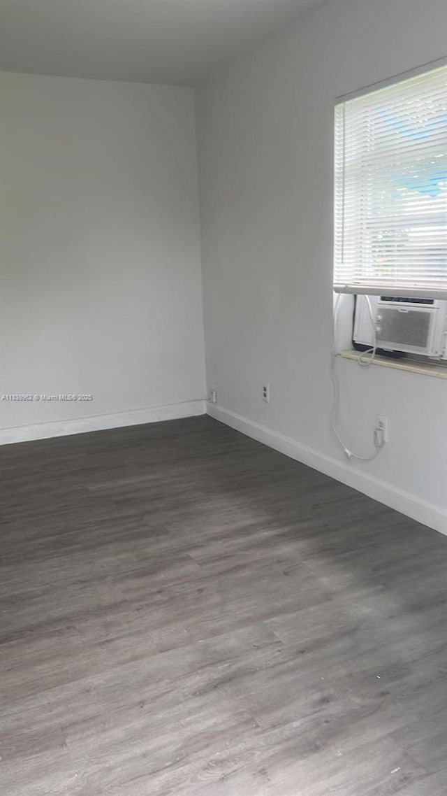 7230 NW 3rd St, Miami, FL 33126 - empty room featuring wood finished floors and cooling unit