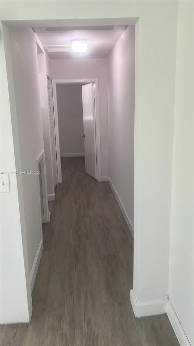 7230 NW 3rd St, Miami, FL 33126 - hallway with baseboards and wood finished floors