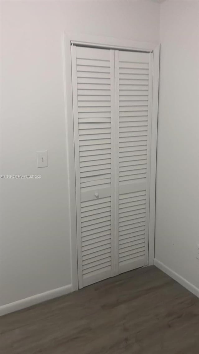 7230 NW 3rd St, Miami, FL 33126 - detailed view of baseboards and wood finished floors