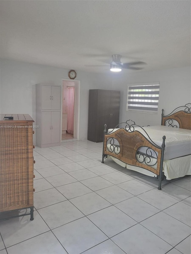 305 NW Opa Locka Blvd, North Miami, FL 33168 - bedroom featuring light tile patterned floors and ceiling fan