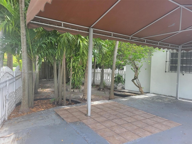 305 NW Opa Locka Blvd, North Miami, FL 33168 - fenced backyard with a patio area