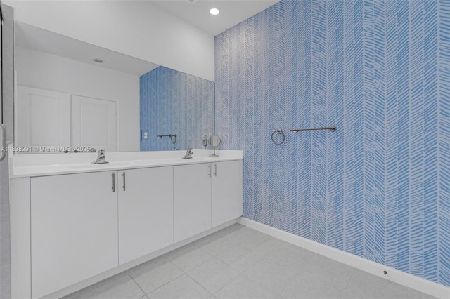 14864 SW 163rd Ter, Miami, FL 33187 - bathroom featuring wallpapered walls, double vanity, and recessed lighting
