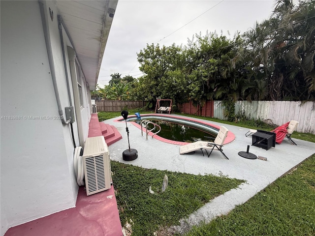 6550 SW 56th St, Davie, FL 33314 - view of pool with a fenced backyard and a patio