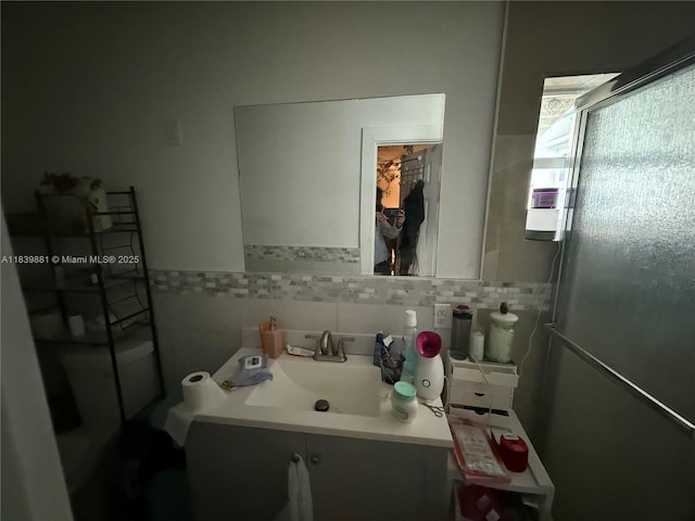 6550 SW 56th St, Davie, FL 33314 - bathroom featuring vanity and tile walls