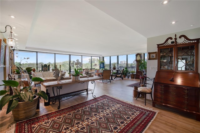 700 Coral Way Unit 4, Coral Gables, FL 33134 - living room featuring wood finished floors, a wall of windows, and recessed lighting