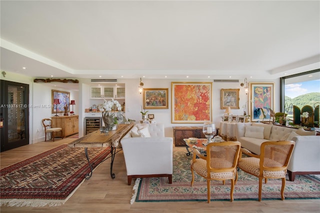 700 Coral Way Unit 4, Coral Gables, FL 33134 - living area with light wood finished floors, recessed lighting, and beverage cooler
