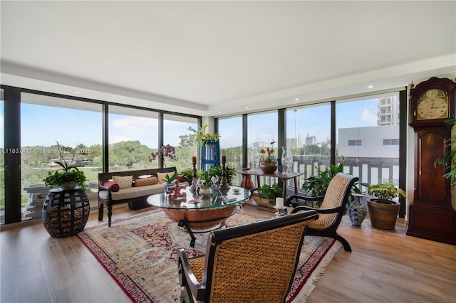 700 Coral Way Unit 4, Coral Gables, FL 33134 - sunroom with expansive windows, wood finished floors, and recessed lighting