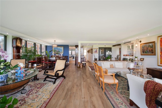 700 Coral Way Unit 4, Coral Gables, FL 33134 - living room featuring wood finished floors and a chandelier
