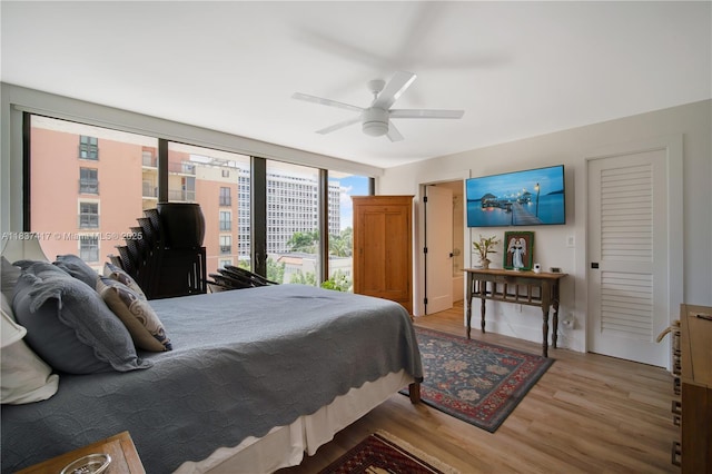 700 Coral Way Unit 4, Coral Gables, FL 33134 - bedroom with light wood-type flooring and a ceiling fan