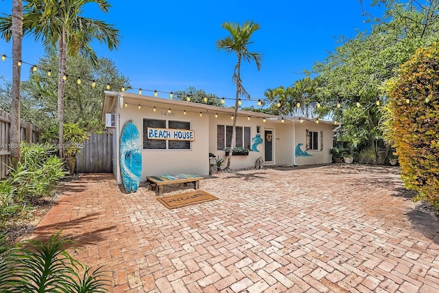 1420 NE 15th Ave, Fort Lauderdale, FL 33304 - rear view of house with stucco siding