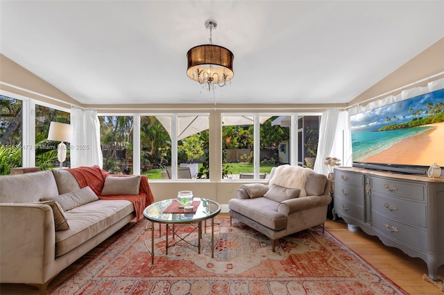 1420 NE 15th Ave, Fort Lauderdale, FL 33304 - sunroom / solarium featuring vaulted ceiling and healthy amount of natural light