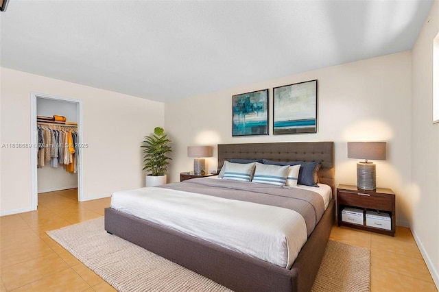 500 S Luna Ct Unit 6, Hollywood, FL 33021 - bedroom featuring light tile patterned flooring and a spacious closet