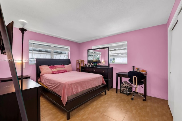 500 S Luna Ct Unit 6, Hollywood, FL 33021 - bedroom with multiple windows and an office area