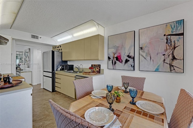 1201 S Ocean Dr Unit 904N, Hollywood, FL 33019 - dining area with a textured ceiling and lofted ceiling