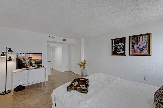 1201 S Ocean Dr Unit 904N, Hollywood, FL 33019 - bedroom featuring a textured ceiling