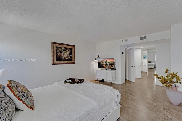 1201 S Ocean Dr Unit 904N, Hollywood, FL 33019 - bedroom featuring a textured ceiling