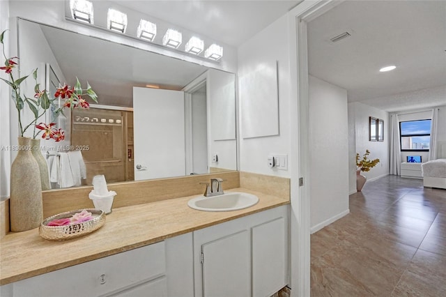 1201 S Ocean Dr Unit 904N, Hollywood, FL 33019 - bathroom featuring vanity, a shower, and tile patterned floors
