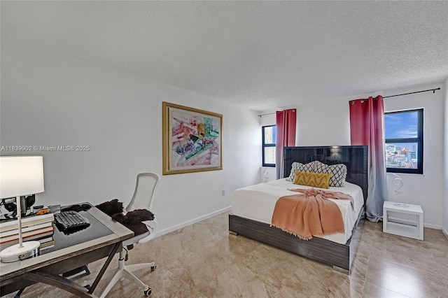 1201 S Ocean Dr Unit 904N, Hollywood, FL 33019 - bedroom with an office area and a textured ceiling