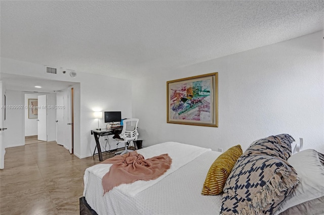 1201 S Ocean Dr Unit 904N, Hollywood, FL 33019 - bedroom featuring a textured ceiling and a desk