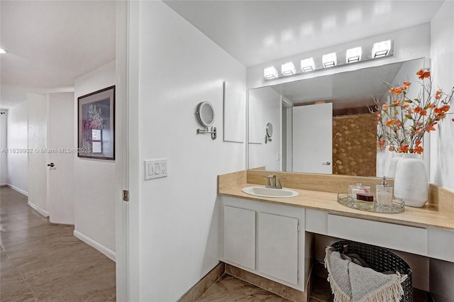 1201 S Ocean Dr Unit 904N, Hollywood, FL 33019 - bathroom with baseboards and vanity