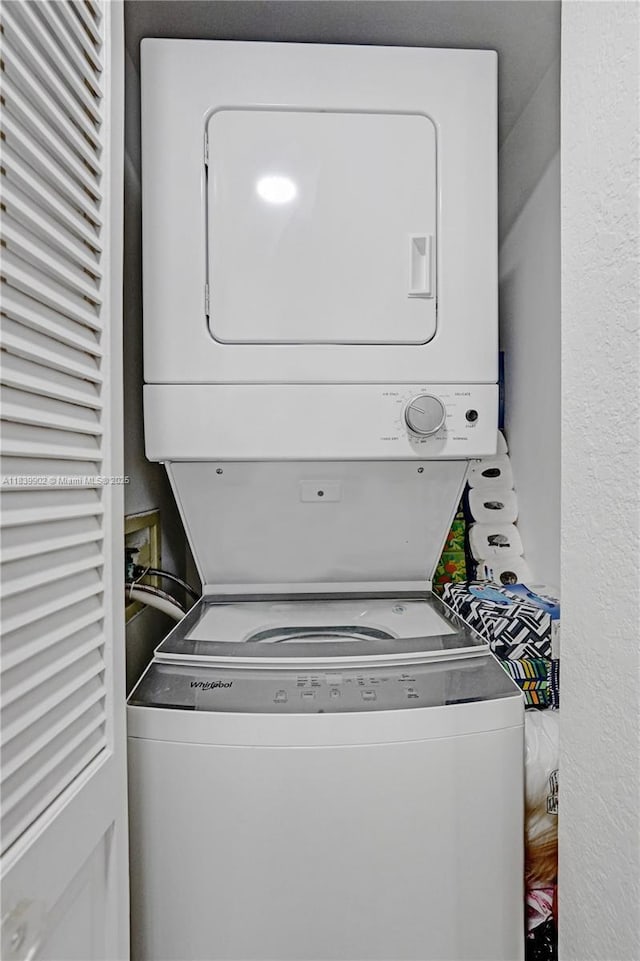1201 S Ocean Dr Unit 904N, Hollywood, FL 33019 - washroom with stacked washing machine and dryer