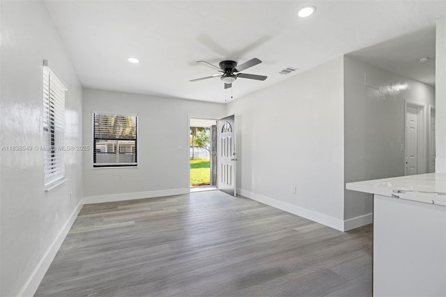 15900 NW 18th Ave, Miami Gardens, FL 33054 - unfurnished room with a ceiling fan, wood finished floors, and recessed lighting