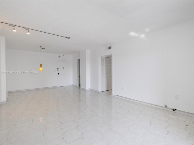 400 Kings Point Dr Unit 523, Sunny Isles Beach, FL 33160 - spare room featuring baseboards