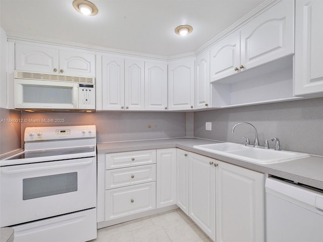 400 Kings Point Dr Unit 523, Sunny Isles Beach, FL 33160 - kitchen featuring white appliances, white cabinetry, light countertops, open shelves, and light tile patterned floors