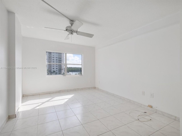 400 Kings Point Dr Unit 523, Sunny Isles Beach, FL 33160 - unfurnished room with ceiling fan and light tile patterned floors