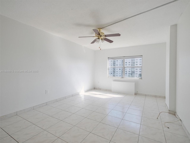 400 Kings Point Dr Unit 523, Sunny Isles Beach, FL 33160 - empty room with ceiling fan and light tile patterned flooring