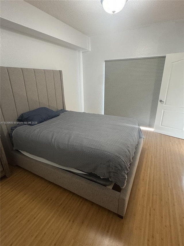 6001 SW 70th St Unit 304, South Miami, FL 33143 - bedroom featuring light wood finished floors