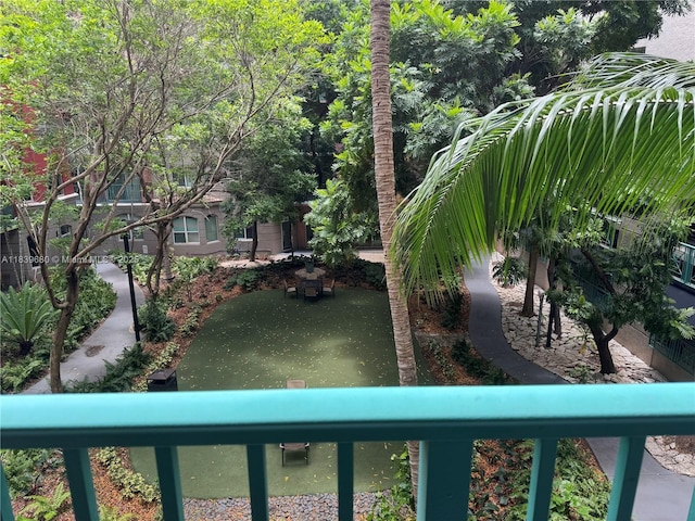 6001 SW 70th St Unit 304, South Miami, FL 33143 - view of yard featuring a balcony