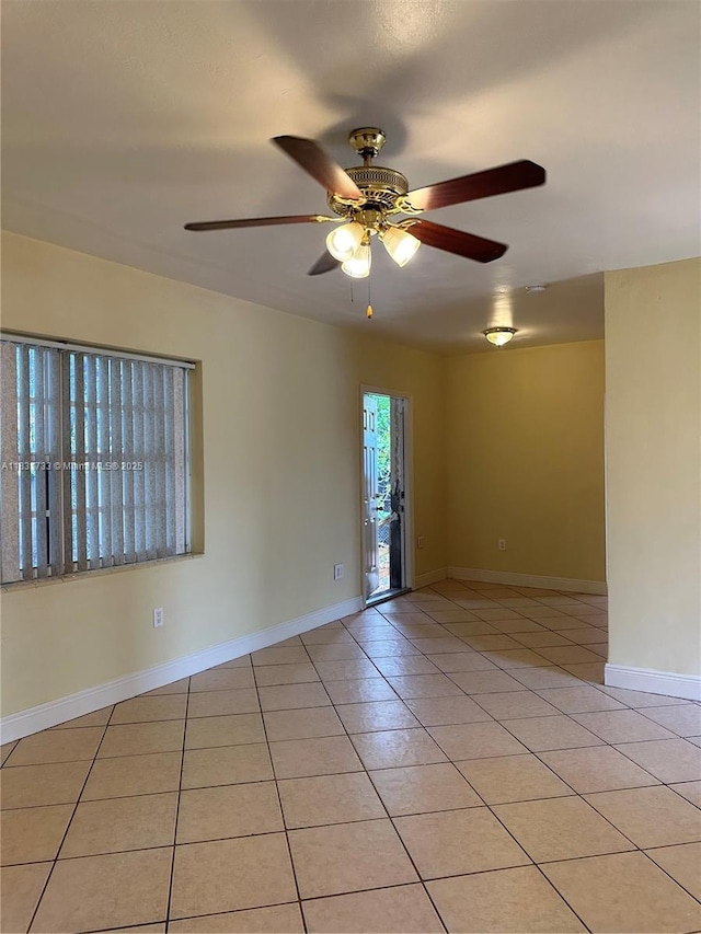 658 SE 8th Pl, Hialeah, FL 33010 - unfurnished room featuring light tile patterned floors and a ceiling fan