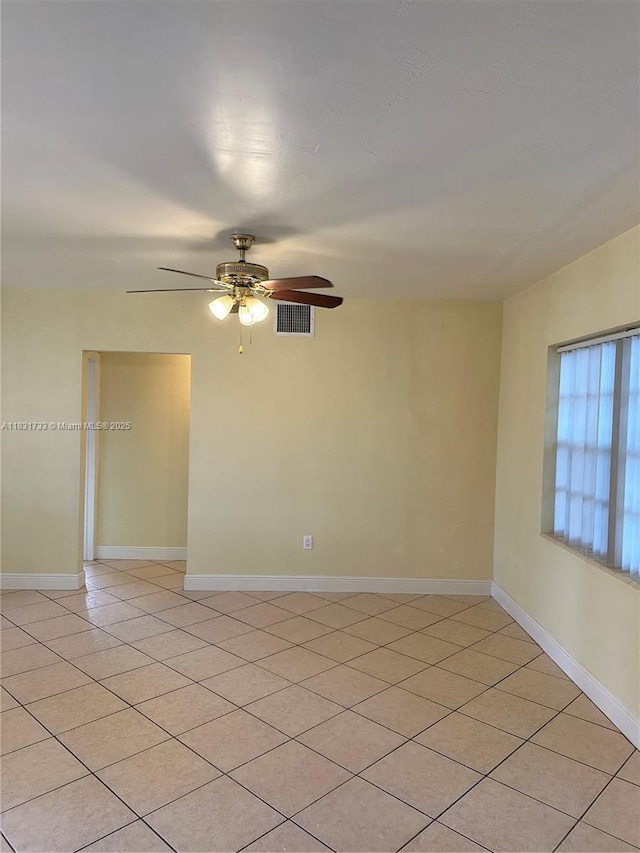 658 SE 8th Pl, Hialeah, FL 33010 - empty room featuring a ceiling fan and light tile patterned floors