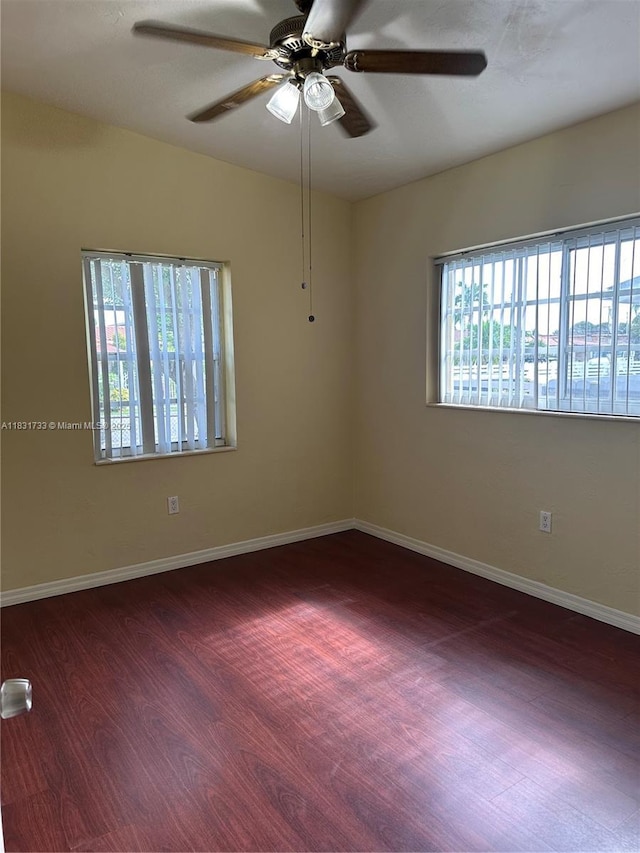 658 SE 8th Pl, Hialeah, FL 33010 - empty room featuring ceiling fan and wood finished floors