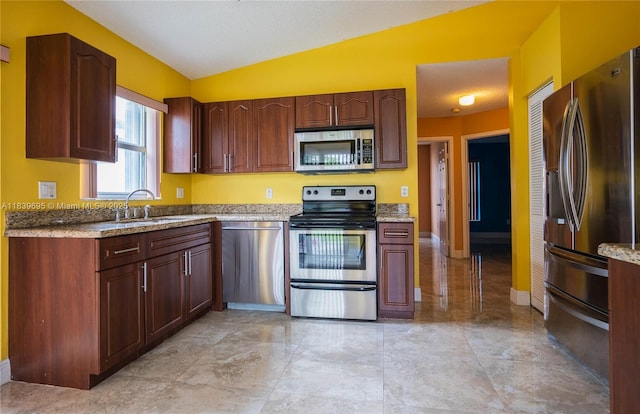 14677 SW 123rd Ave, Miami, FL 33186 - kitchen with appliances with stainless steel finishes and vaulted ceiling