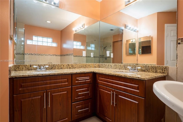 14677 SW 123rd Ave, Miami, FL 33186 - full bath featuring a stall shower, tile walls, and double vanity