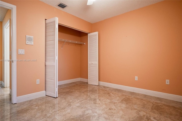 14677 SW 123rd Ave, Miami, FL 33186 - unfurnished bedroom featuring a closet, a textured ceiling, and a ceiling fan