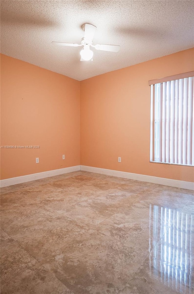 14677 SW 123rd Ave, Miami, FL 33186 - unfurnished room featuring a ceiling fan and a textured ceiling