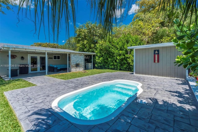 11940 NW 33rd St, Sunrise, FL 33323 - view of swimming pool with french doors, a patio area, a hot tub, and a yard