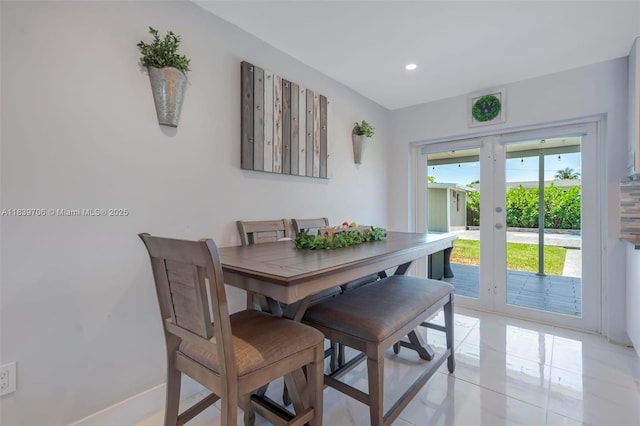11940 NW 33rd St, Sunrise, FL 33323 - dining area featuring french doors, light tile patterned floors, and recessed lighting