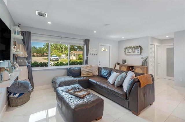 11940 NW 33rd St, Sunrise, FL 33323 - living room featuring marble finish flooring and recessed lighting