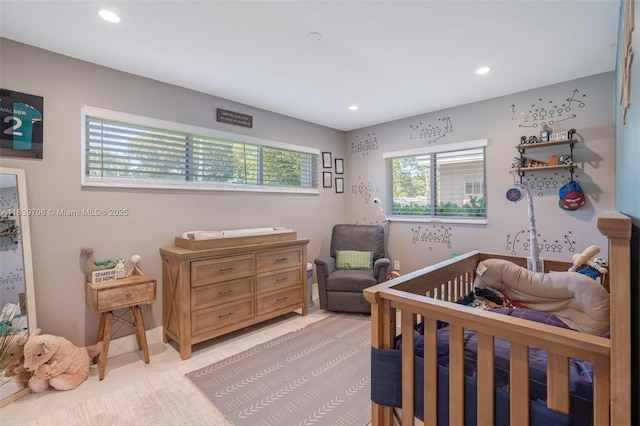 11940 NW 33rd St, Sunrise, FL 33323 - bedroom featuring recessed lighting and a nursery area