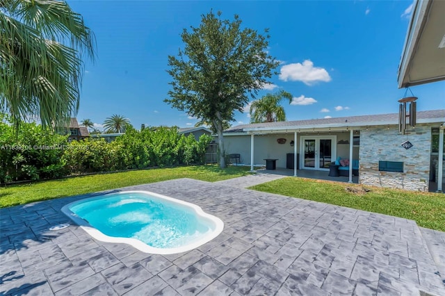 11940 NW 33rd St, Sunrise, FL 33323 - view of pool with french doors, a patio area, and a fenced backyard