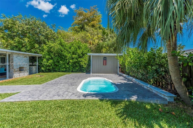 11940 NW 33rd St, Sunrise, FL 33323 - view of pool featuring a yard, an outbuilding, and a patio