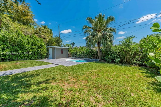 11940 NW 33rd St, Sunrise, FL 33323 - view of yard with a storage shed