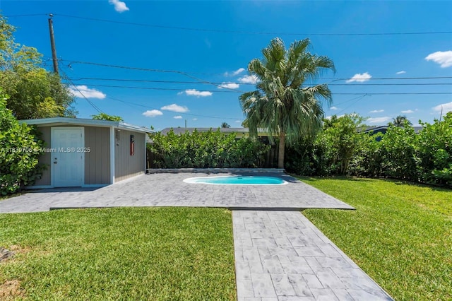 11940 NW 33rd St, Sunrise, FL 33323 - view of yard with an outbuilding, a patio area, a pool, and an in-ground hot tub